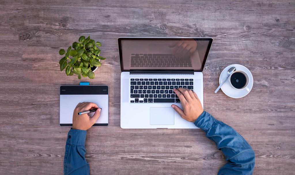 Modern translation office with multilingual documents and professional linguists working